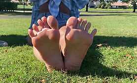 Appetizing Oiled up meaty toes in a Public Park