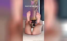 Mabel Summer not minding you while you stare at sexy feet